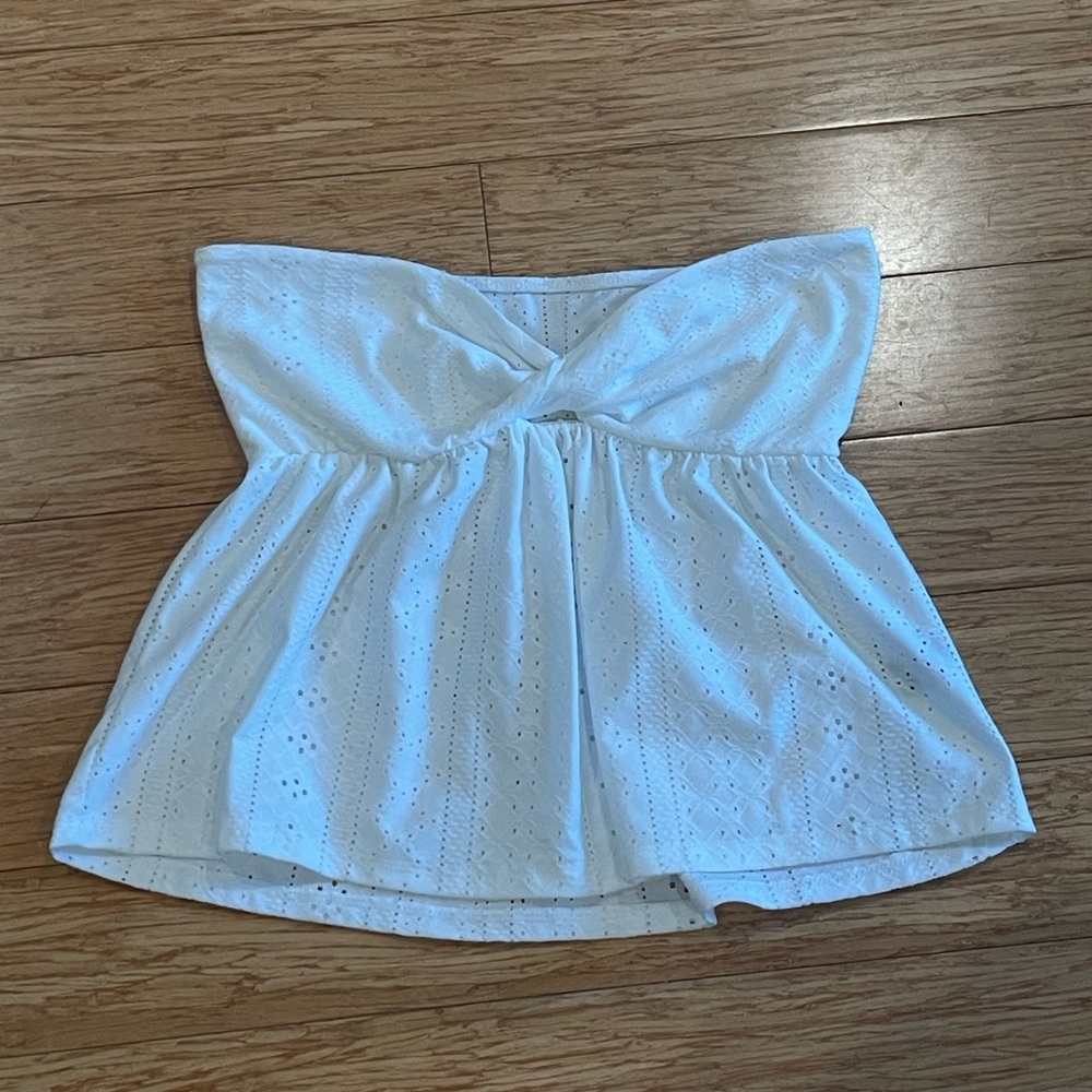 Strapless eyelet top